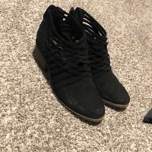 Black suede booties with strapy detail